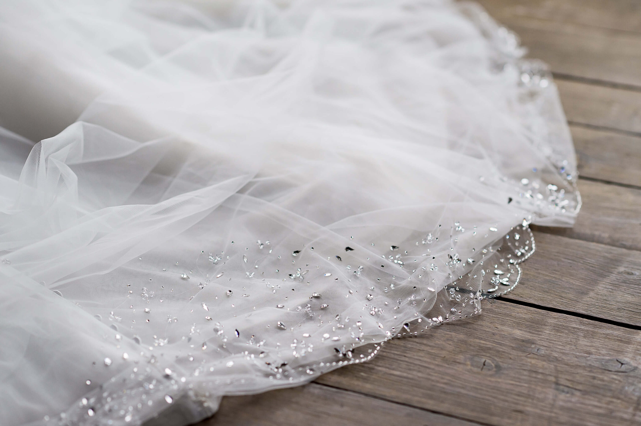 crystal details on a bride's veil. Captured outdoors at Bean Town Ranch