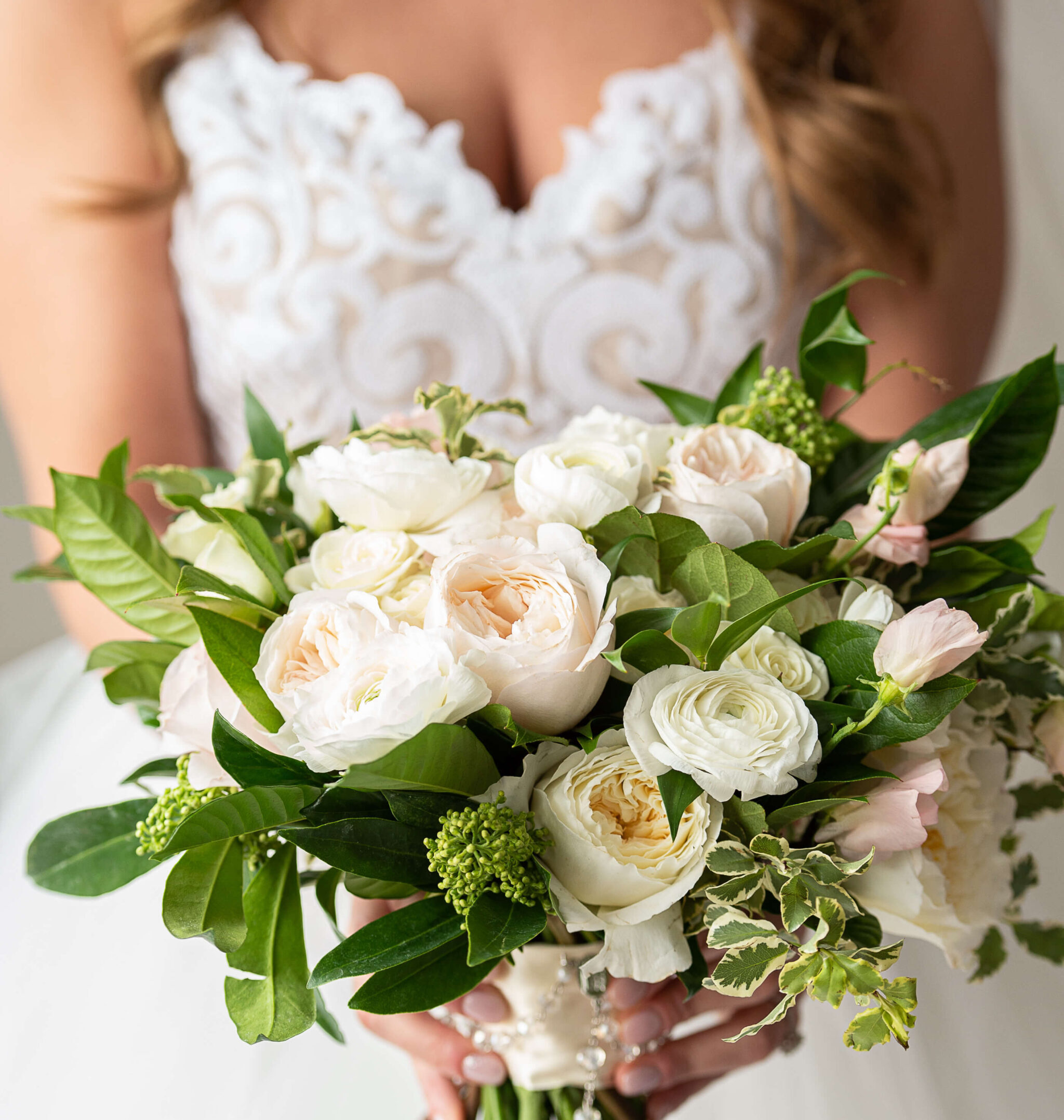 closeup photo of a bride holding a bouquet as part of her series of Ottawa bridal portraits