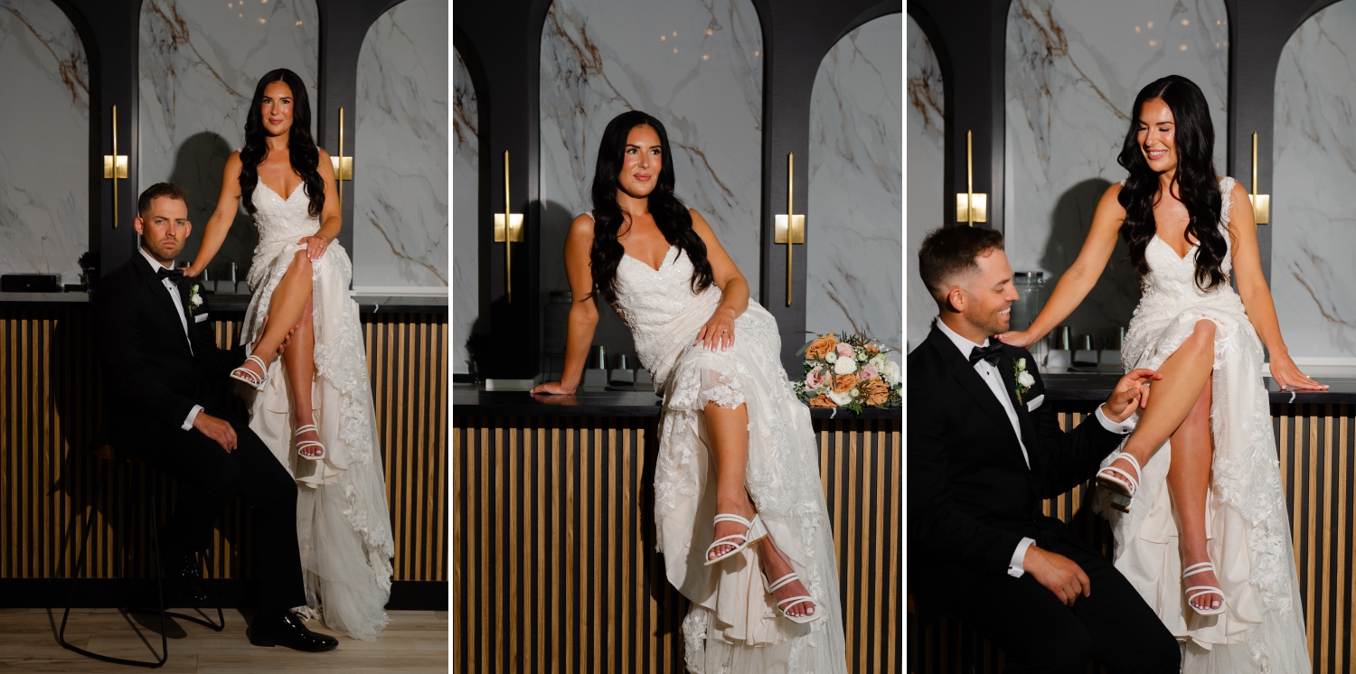 a bride sitting on the Bleeks and Bergamot Wedding Venue bar smiling and flirting with her husband as he touches her leg