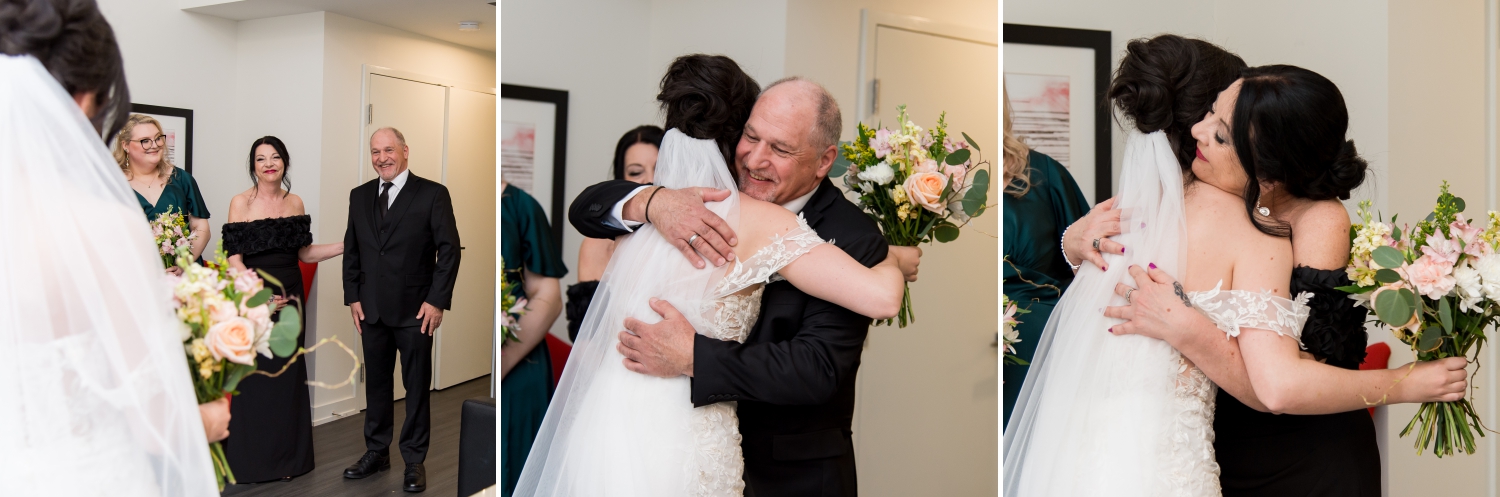 a bride shares a first look hug with her mom and dad in the Restays hotel. Captured by Ottawa wedding photographer JEMMAN Photography