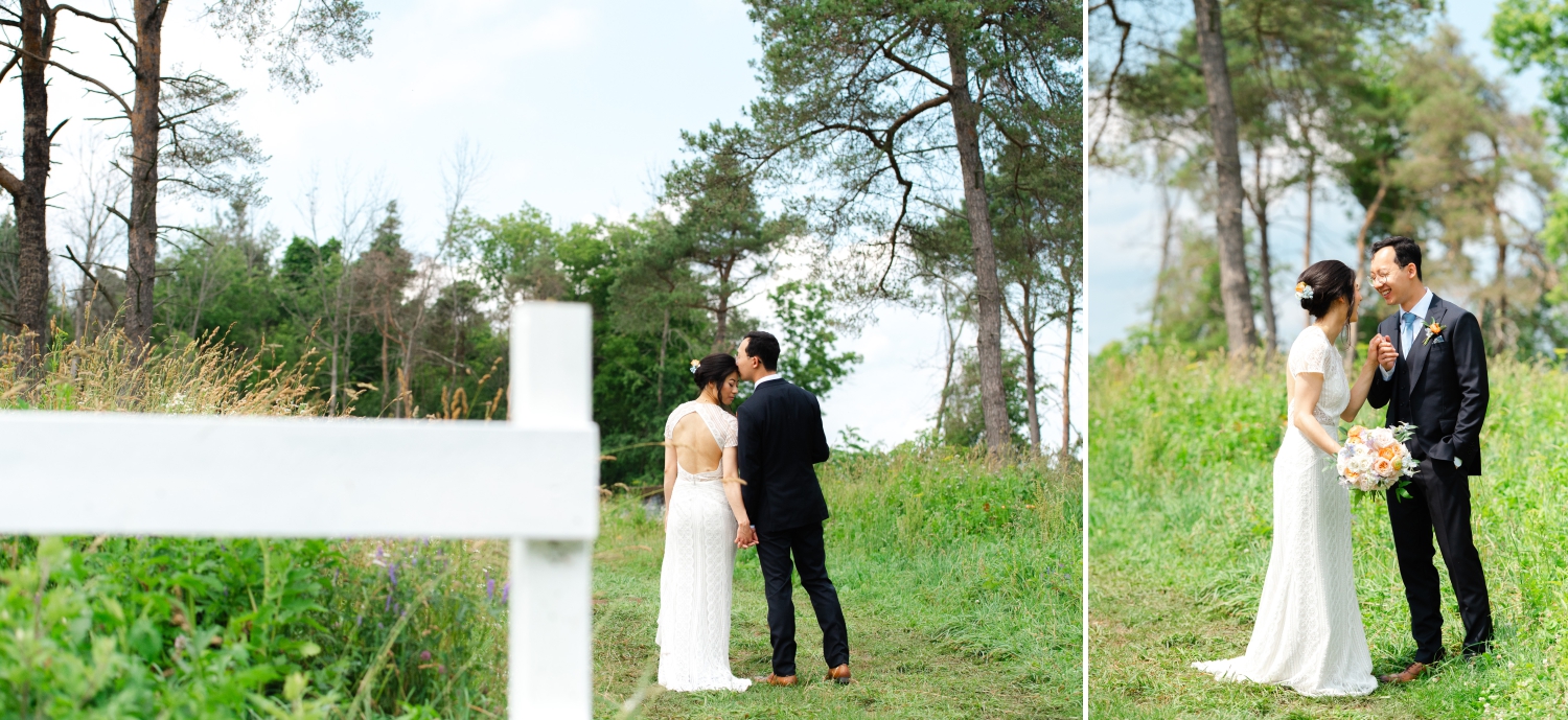 a bride and groom laughing and kissing during their wedding photos. Taken in a field by Ottawa wedding photographer JEMMAN Photography