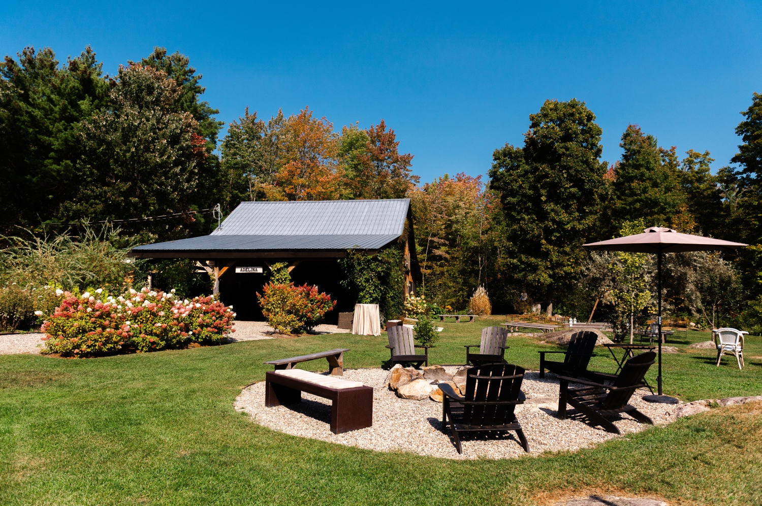 the barn and firepit of the Ottawa outdoor wedding venue, Adelina Barn