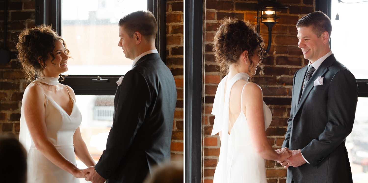 a bride and groom holding hands during their ceremony and smiling at each other. Captured during their Starling Ottawa wedding ceremony by JEMMAN Photography